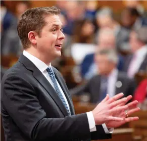  ?? ADRIAN WYLD/THE CANADIAN PRESS ?? Conservati­ve Leader Andrew Scheer was asked at a meeting Thursday with chiefs from the Assembly of First Nations about how his policy would differ from the Harper era.