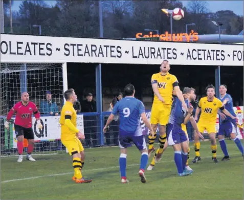  ??  ?? Above, Tim Grice looks to attack on his return to the Leek line-up on Saturday. Right, the minute’s silence.