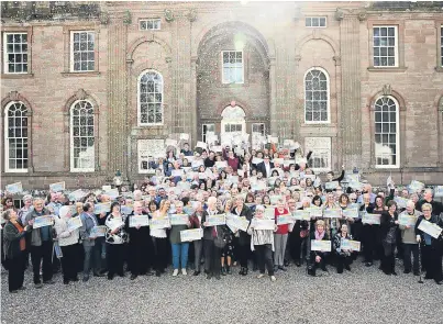  ?? Picture: Iain McLean. ?? Brechin’s People’s Postcode lottery winners with their cheques.