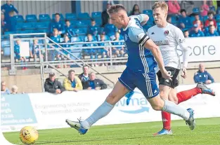  ??  ?? Rory Mcallister scores to give Peterhead the points