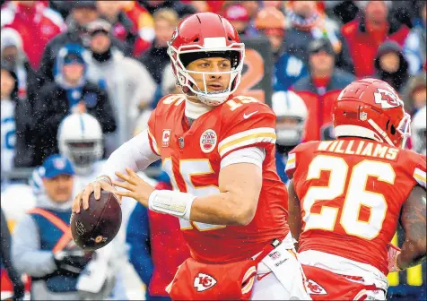  ?? PETER AIKEN/GETTY ?? Chiefs quarterbac­k Patrick Mahomes looks to pass against the Colts during an AFC divisional round game at Arrowhead Stadium on Saturday in Kansas City, Mo. Mahomes threw for 278 yards and rushed for a touchdown.