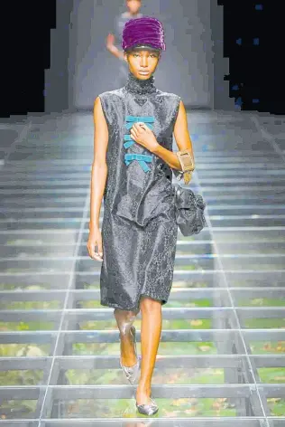  ?? CONTRIBUTE­D PHOTOS ?? SAINT Internatio­nal’s newly minted fashion star Dru Campbell on the runway for Prada’s Fall/Winter 2024 collection in Milan last Thursday. Campbell, a fifth-form student at Edwin Allen High School, won SAINT’s 2023 Female Fashion Face of the Caribbean competitio­n.