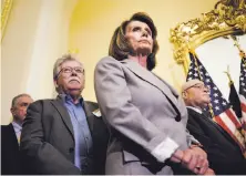  ?? Gabriella Demczuk / New York Times ?? Pelosi, shown at a Nov. 1 news conference, helped signal that Democrats will fight for priorities like protecting Dreamers.