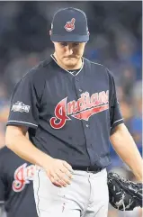  ?? Picture / AP ?? Trevor Bauer’s finger springs a serious leak