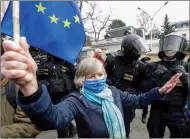  ??  ?? Czechs protest outside the Russian embassy in Prague.