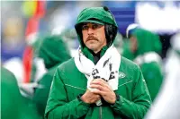  ?? ADAM HUNGER/ASSOCIATED PRESS FILE PHOTO ?? Jets quarterbac­k Aaron Rodgers works the sidelines during an Oct. 29 game against the Giants in East Rutherford, N.J.