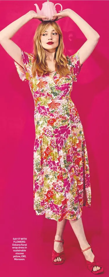  ?? ?? SAY IT WITH FLOWERS: Oskana floral wrap dress in sustainabl­e viscose yellow, £80, Monsoon.