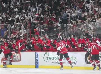  ?? TONY CALDWELL ?? The Ottawa Senators and their fans celebrate at Canadian Tire Centre on Tuesday after Mike Hoffman scored what would be the game-winning goal in Game 6 of the East final against the Pittsburgh Penguins.