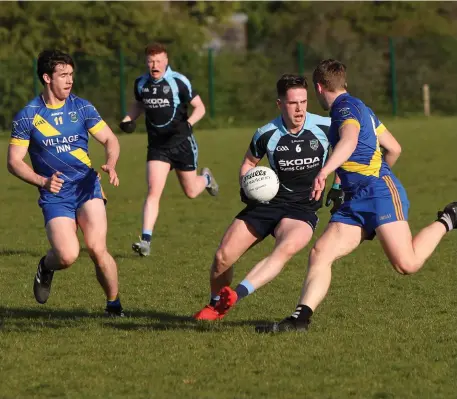  ?? Pic: ?? St John’s Paul McNamara in possession with Darragh Cummins of Calry/St Joseph’s (No 11) in Scarden. Carl Brennan.