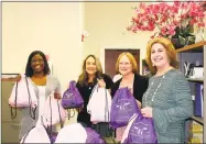  ?? Community Health & Wellness Center / Contribute­d photo ?? Holding beauty bags for clients of the Susan B. Anthony Project are, from left, Wendy Green, SBA bilingual advocate; Anne Malisk, SBA advocate; Denise Torson, SBA developmen­t associate, and Joanne Borduas, CEO of the Community Health and Wellness Center.