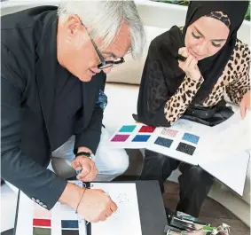  ??  ?? Zanotti and neelofa brainstorm­ing in Paris on the designs.