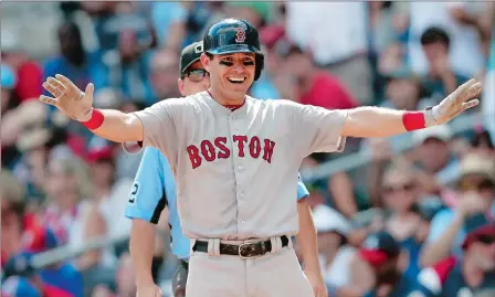  ?? JOHN BAZEMORE/AP PHOTO ?? Red Sox second baseman Ian Kinsler reacts after driving in two runs with a base hit in the eighth inning of Monday’s 8-2 win over the Braves.