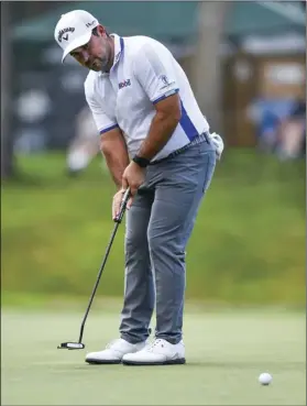  ?? MEG MCLAUGHLIN/QUAD CITY TIMES VIA AP ?? Roberto Diaz putts on the 9th green during the first round of the John Deere Classic at TPC Deere Run in Silvis, Ill., on Thursday.