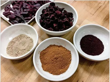  ?? ADDIE BROYLES / AMERICAN-STATESMAN ?? You can buy all kinds of spice mixes and dehydrated powders at the grocery store, but more cooks are making their own. Cane Rosso chef Josh Healy makes, from left, mushroom, tomato and smoked beet powders.