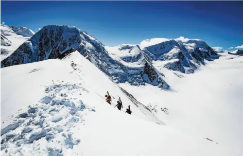  ?? Teton Gravity Research Films ?? Three men venture in Alaska’s remote Chugach Mountains in the new snowboardi­ng feature film “Mountain Revelation­s.”