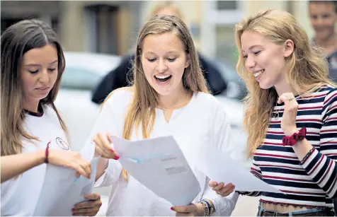  ??  ?? Financial brains: The likes of Reigate Grammar School students Emily White, Goya Verity and Harriet Taggart, above, will hopefully not have to live in squalor like The Young Ones, left