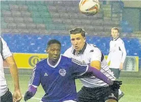  ?? John Rooney ?? Widnes FC’s Tom Mitchell closes down City of Liverpool player Aaron Rey in the clash between the sides at the Select Security Stadium on Monday evening which ended honours even.