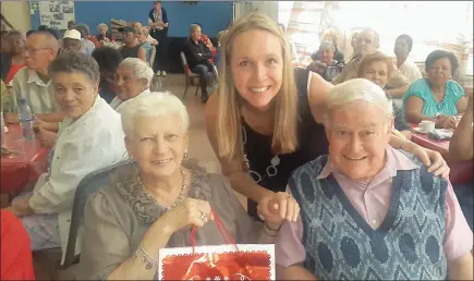  ??  ?? Cherry Barr and Lawrence Heiberg with Cindy Norcutt enjoying a festive get-together.