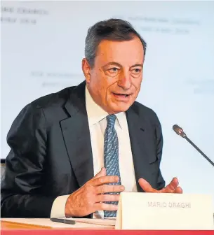  ?? ILMARS ZNOTINS/AGENCE FRANCE-PRESSE ?? ECB President Mario Draghi gives a press conference in Riga, Latvia, last week.