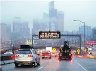  ?? ELAINE THOMPSON / THE ASSOCIATED PRESS ?? Rush-hour traffic heads toward the Alaskan Way Viaduct, a well-used Seattle thoroughfa­re that closes Friday.