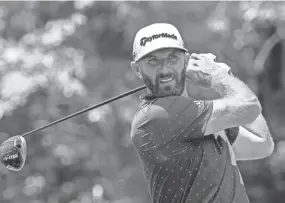  ?? STEPHEN B. MORTON/AP ?? Dustin Johnson watches his drive down the ninth fairway during the first round of the Palmetto Championsh­ip on Thursday.