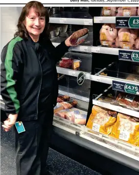  ??  ?? Late shift: Elaine Thompson in the job she loves at Marks & Spencer