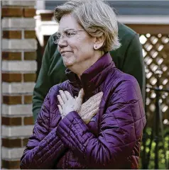  ?? STEVEN SENNE / ASSOCIATED PRESS ?? Sen. Elizabeth Warren, D-Mass., acknowledg­es supporters before speaking to the media Thursday in Cambridge, Massachuse­tts.