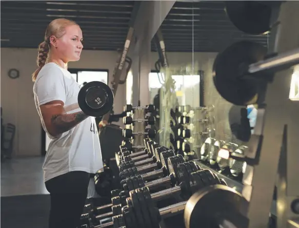  ?? Picture: GLENN HAMPSON ?? Kasey Evans has just started a new fitness studio inspired by her own battle with mental illness.