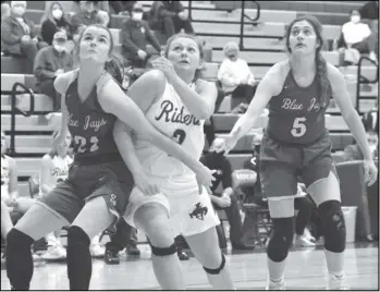  ?? Staff photo/ Jake Dowling ?? St. Marys’ Haley Felver battles with Delphos St. John’s Abby Buettner during a non-league girls basketball game on Tuesday at Memorial High School.