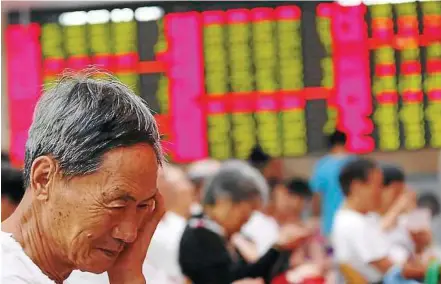  ??  ?? The Shanghai Composite Index, which doubled in 10 months through August 2009 as the government poured US$652bil of stimulus into building roads, railways and housing, has tumbled 43% from its high. — AP