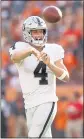  ?? MATTHEW STOCKMAN — AP ?? QB Derek Carr completed 29 of 32 passes Sunday in a loss to the Denver Broncos.