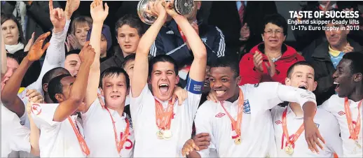  ??  ?? TASTE OF SUCCESS England skipper Coady lifts U-17s Euro trophy in 2010