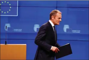  ?? AP/FRANK AUGSTEIN ?? European Council President Donald Tusk said Wednesday in Brussels that a short delay in Britain’s scheduled exit from the EU would be possible, but only after “a positive vote on the withdrawal agreement” by British lawmakers.