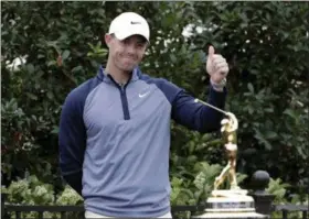  ?? LYNNE SLADKY — THE ASSOCIATED PRESS ?? Rory McIlroy gives a thumbs-up after winning The Players Championsh­ip on March 17.