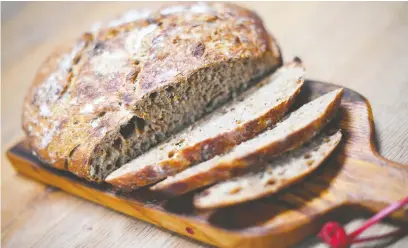  ??  ?? Many have turned to activities like baking bread that offer the simple comfort of working with the hands, writes Mary-leah de Zwart.