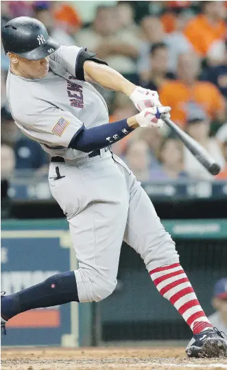  ?? BOB LEVEY/GETTY IMAGES ?? Outfielder Aaron Judge has become a cult hero in his first full season with the New York Yankees, garnering 4.5 million all-star votes for the July 11 all-star game in Miami.