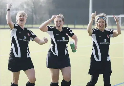  ?? PICTURE: KATE LOUISE MCSHANE ?? Three members of the Bourne Deeping Ladies second team celebrate their title win.