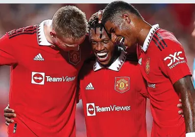  ?? GETTY IMAGES ?? Exquisite finish: Fred celebrates with Marcus Rashford (right) and Scott McTominay (left)