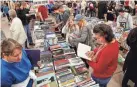  ?? THE OKLAHOMAN FILE ?? The Friends of the Metropolit­an Library System is hosting its annual book sale, seen here in 2015, in February at State Fair Park in Oklahoma City.