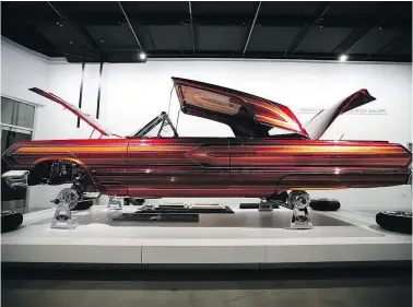  ?? — PHOTOS: THE ASSOCIATED PRESS FILES ?? El Rey, a 1963 Chevrolet Impala by Albert de Alba, Sr., is one of the signature pieces on display at the exhibition The High Art of Riding Low at the Petersen Automotive Museum in Los Angeles.