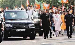  ?? PTI PHOTO ?? Prime Minister Narendra Modi during a roadshow in Bhubaneswa­r on Saturday