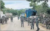  ?? AFP ?? CRPF officials stand guard at the national highway in Lailapur area near Assam-Mizoram border on August 1.