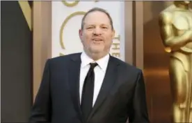  ?? PHOTO BY JORDAN STRAUSS — INVISION — AP, FILE ?? In this file photo, movie mogul Harvey Weinstein arrives at the Oscars at the Dolby Theatre in Los Angeles.