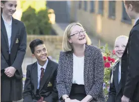  ??  ?? Senior pupils chatting to head of the Cathedral School, Clare Sherwood