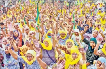  ?? PTI ?? Members of various farmers' organisati­ons stage a protest against the farm bills in Patiala on Sunday.