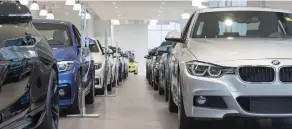  ?? STEPHEN THORNE ?? A parade of 16 gleaming new BMW models forms two impressive lines down the middle of Otto BMW’s bright, expansive showroom floor.