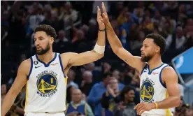  ?? Photograph: Kyle Terada/USA Today Sports ?? Warriors guard Klay Thompson (11) high-fives Stephen Curry (30) during the second quarter of Tuesday’s game against the Lakers at Chase Center in San Francisco.