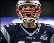  ?? CHARLES KRUPA — THE ASSOCIATED PRESS FILE ?? In this Sept. 10 photo, New England Patriots quarterbac­k Tom Brady yells as he takes the field before the first game of the season against the Steelers in Foxborough, Mass.