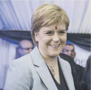  ?? PICTURE: LENNY WARREN ?? 0 Nicola Sturgeon sports a bindi during the traditiona­l Indian ceremony