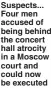  ?? ?? Suspects... Four men accused of being behind the concert hall atrocity in a Moscow court and could now be executed